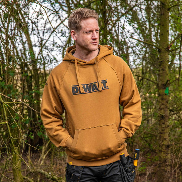DEWALT Berlin Men's Cotton Poly, Water Resistant, Regular Fit Hoodie, Dijon, Model Front View