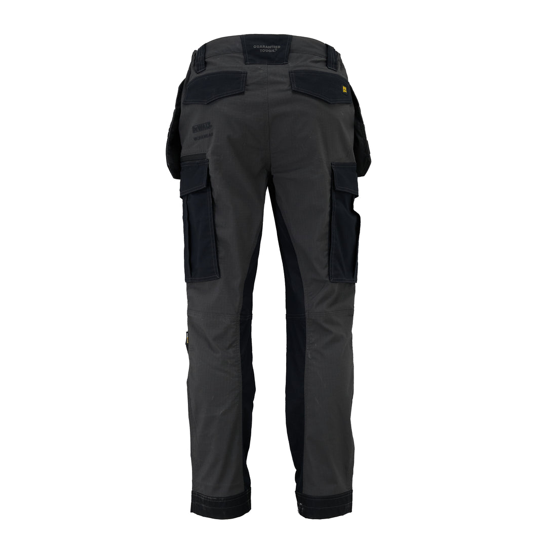 Dark gray work pants with multiple pockets on a white background
