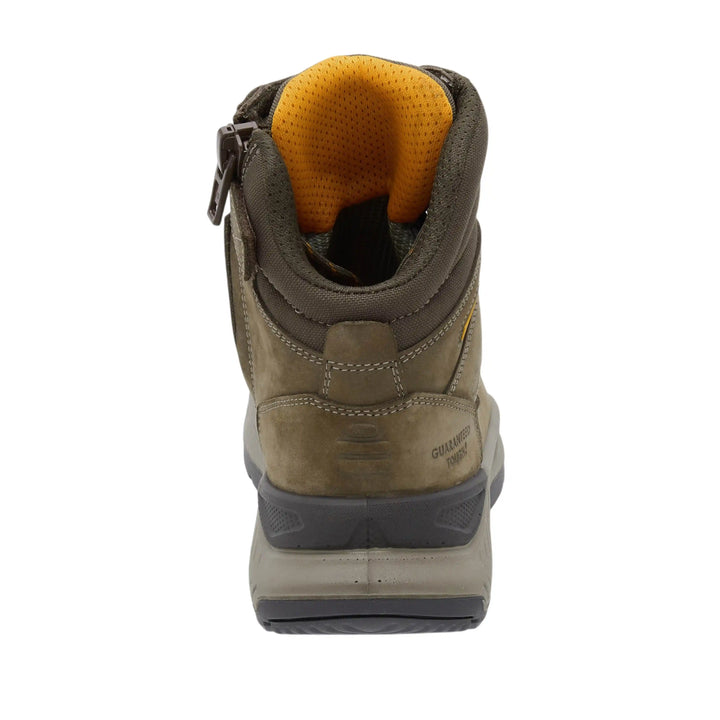 A single mid-cut work boot shown from the rear three-quarter view, featuring a brown suede and synthetic upper, a dark gray sole, and a bright yellow interior lining.