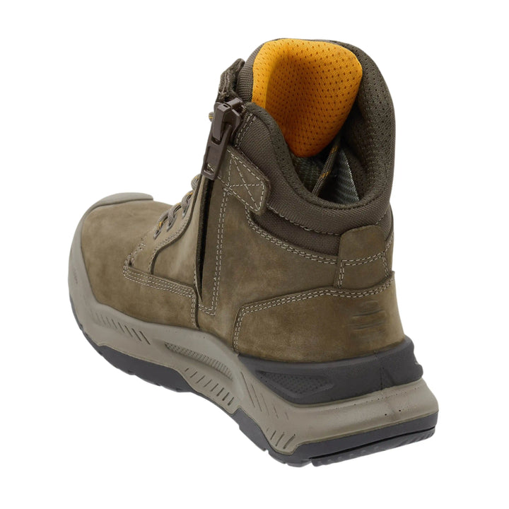 A mid-cut work boot in olive brown suede and synthetic fabric, featuring a side zipper, lace-up front, and a bright yellow interior lining, shown from a three-quarters rear angle on a white background.