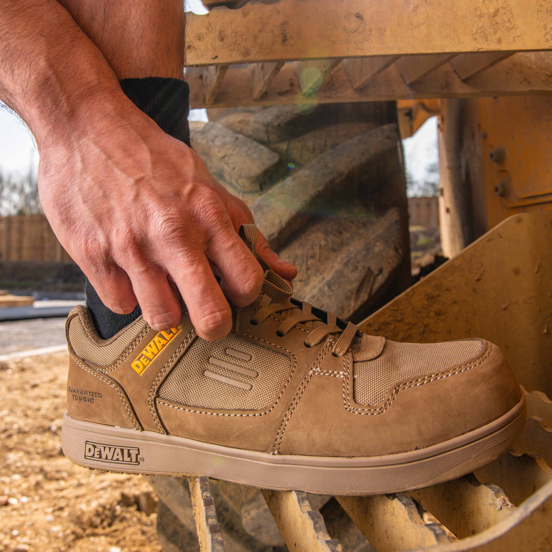 DEWALT Macon Men's Lightweight, Non-Metallic, Penetration Resistant, CoolMax Work Safety Trainer, Stone, Model View Close Up Facing Right
