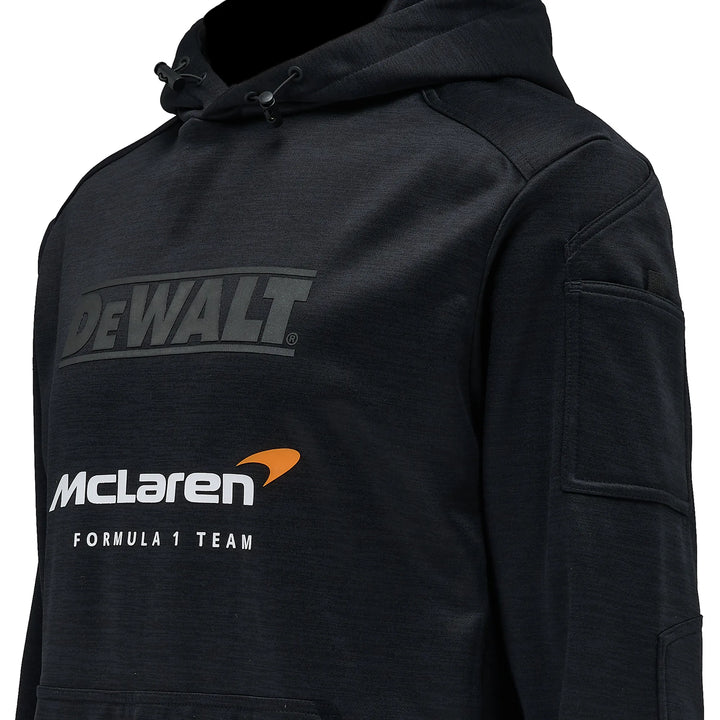 A close-up of a black hooded sweatshirt featuring a dark gray 'DEWALT' logo on the chest and a white 'McLaren Formula 1 Team' logo with an orange accent on the front.