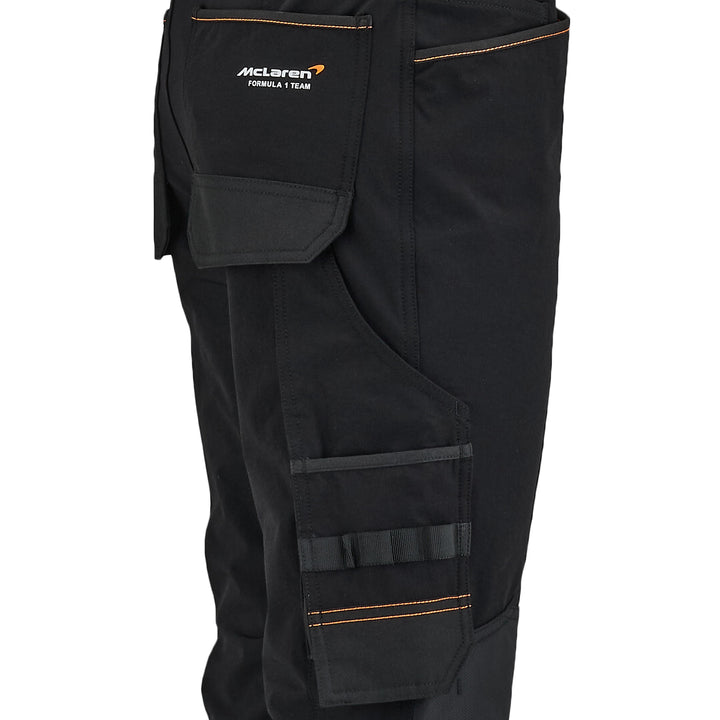 Black cargo pants with McLaren Formula 1 Team logo on a white background